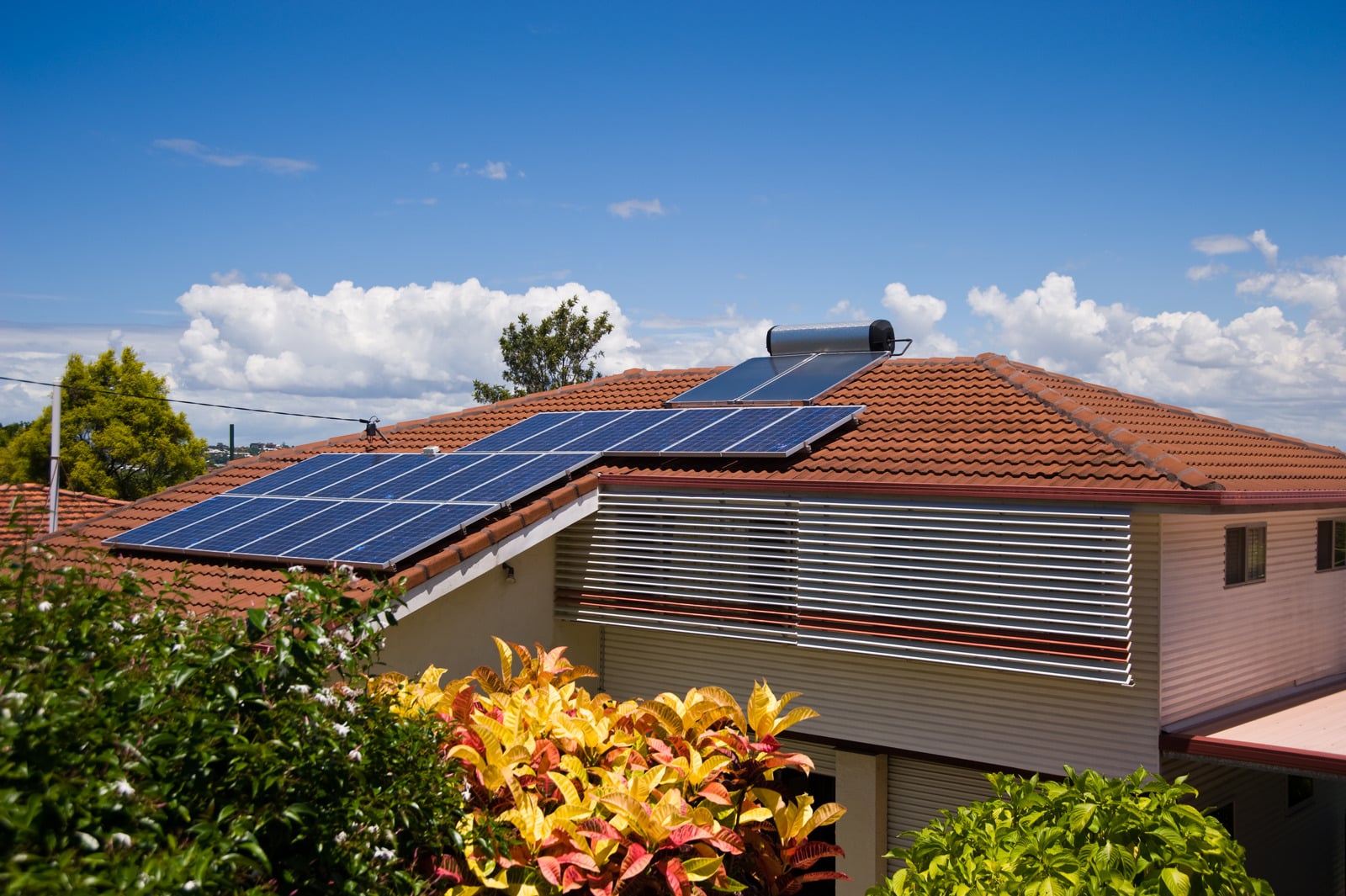 Solar Electricity and Hot Water System on house roof